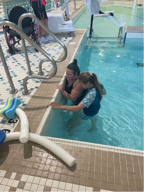 Aquatic therapy session with a rec therapist